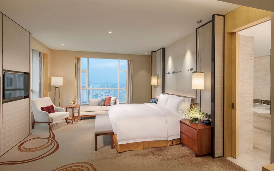 Premium bedding, down comforters, minibar, in-room safe