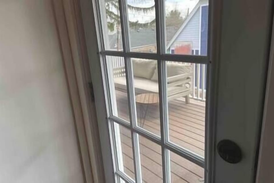 Door to the deck (there are 2 doors to the deck, one from the LR and one from the bedroom)
