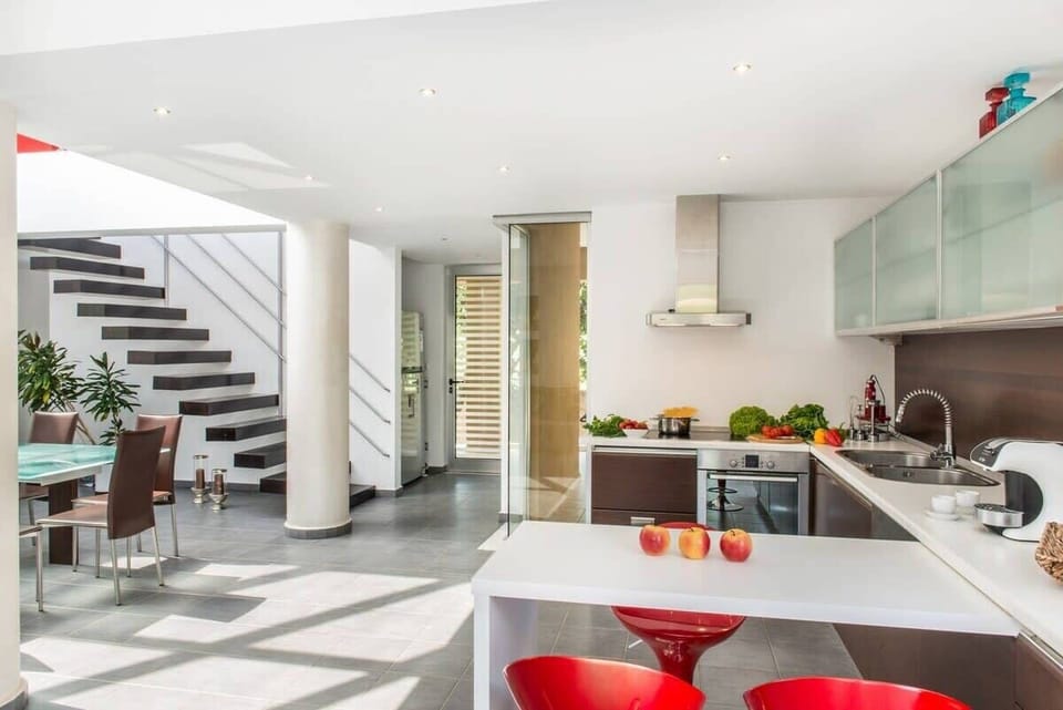 Fully Equipped Kitchen Bathed in Natural Light