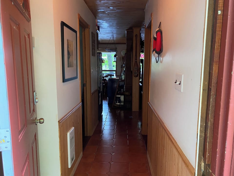 Front door entrance. A mud room with a closet is on the immediate left.