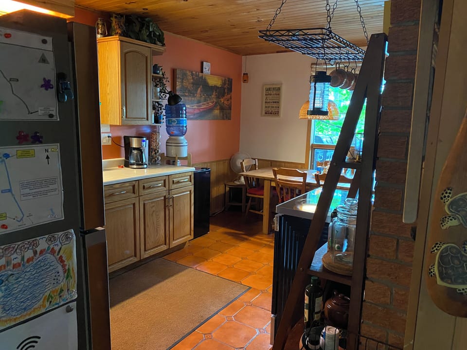 A view from the hallway into the kitchen.
