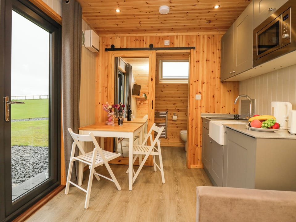 Fridge, electric kettle, cookware/dishes/utensils