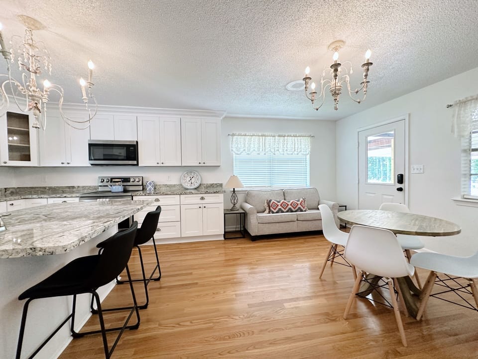 This open kitchen floorplan with it's own  breakfast nook is made for hosting! 
