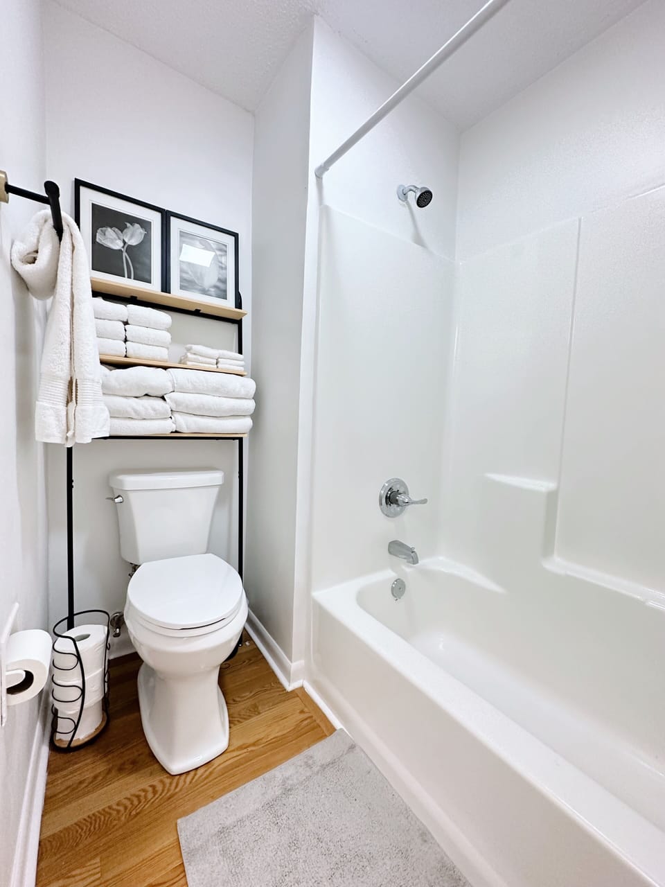 Clean guest bathroom with tub/shower combo and all you need for a relaxing stay!