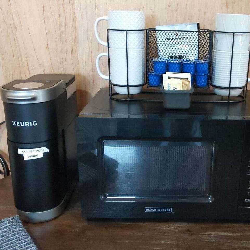 Keurig Coffee Maker, coffee, creamer, and sugar provided! 