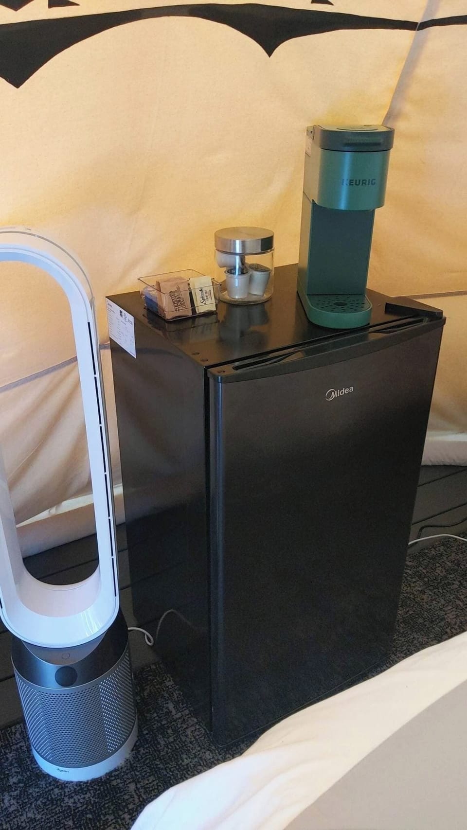 Keurig Coffee Maker, coffee, creamer, and sugar are provided! 