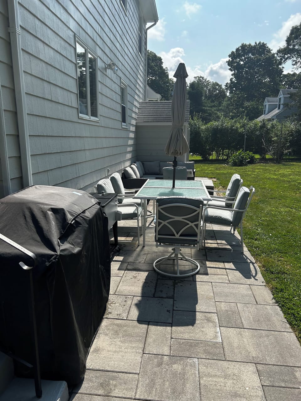 Gas grill, table  w/umbrella, sectional with table, outdoor shower, picnic table