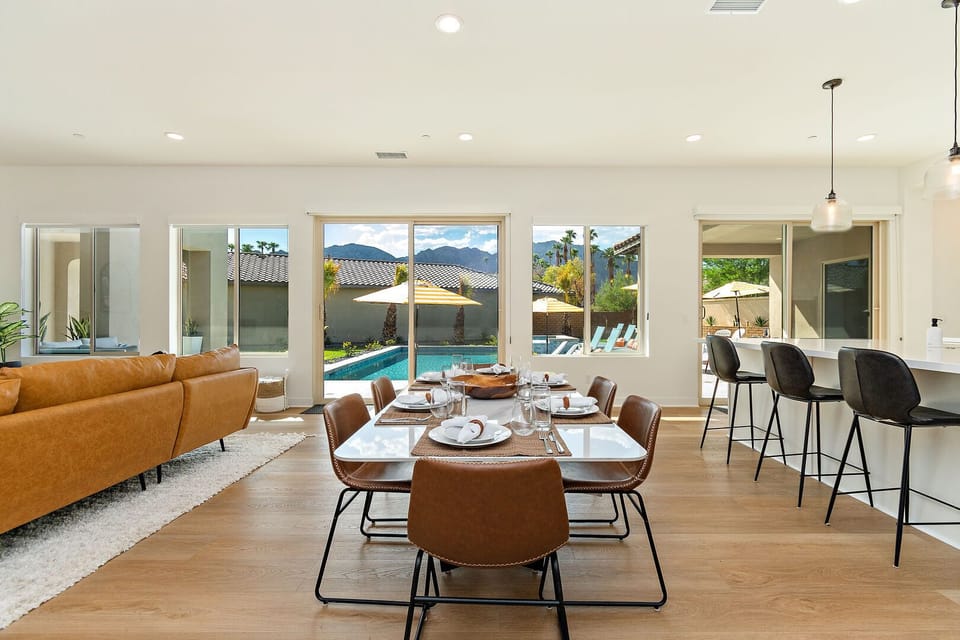 Enjoy the view from the casual dining area featuring a dining table with seating for six.
