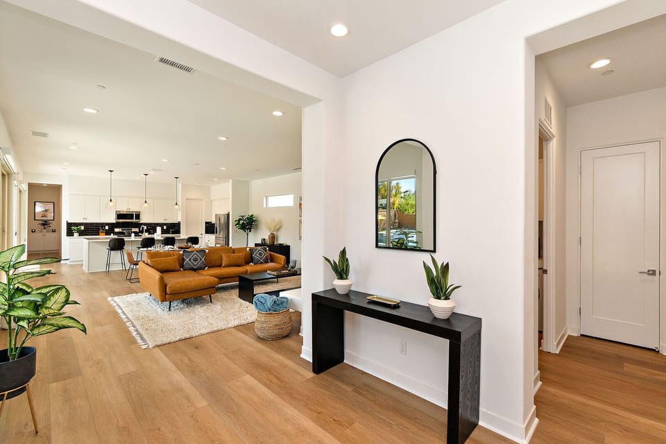 The foyer features a table for you to set down your keys and a mirror so you can ensure you're ready to take on the night!