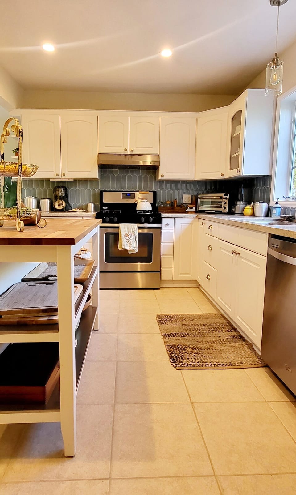 well stocked kitchen with all the gadgets and goodies a real cook wants