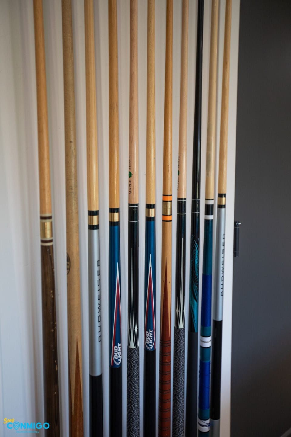 Ready for friendly matches — pool cues for endless game night fun.