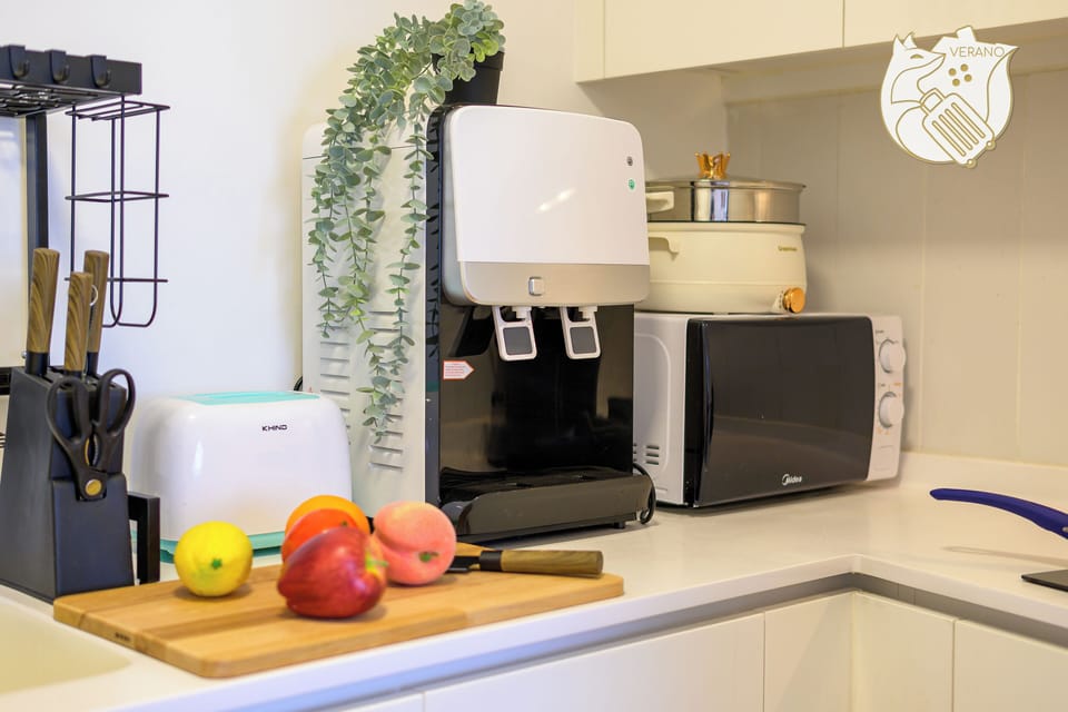 Fridge, microwave, toaster, dining table