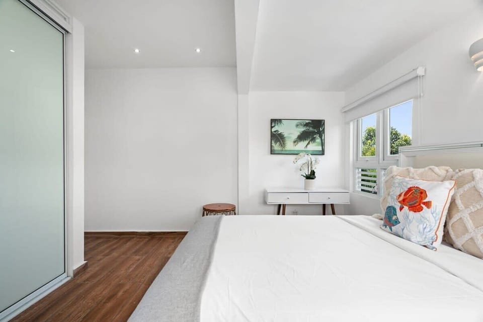 The second bedroom has a full-size bed with closet.
