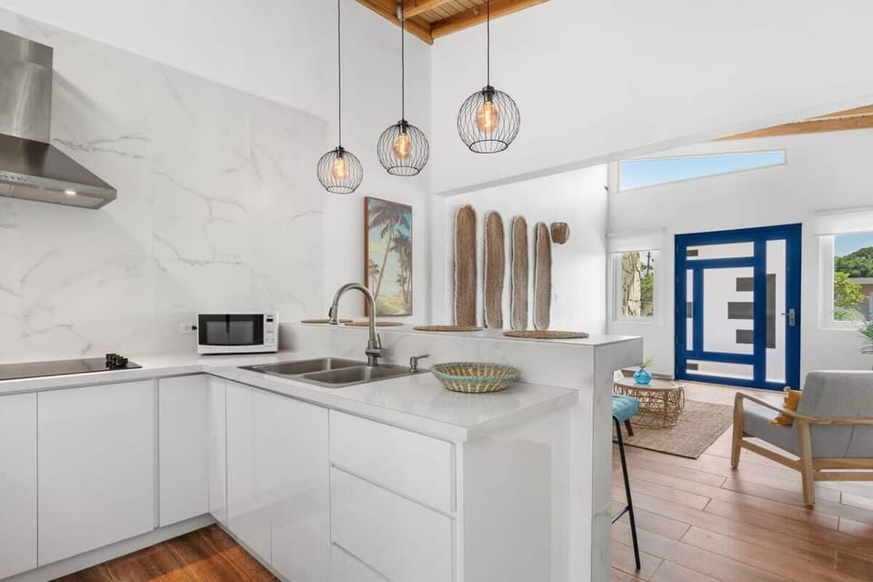 The kitchen opens up to the living room