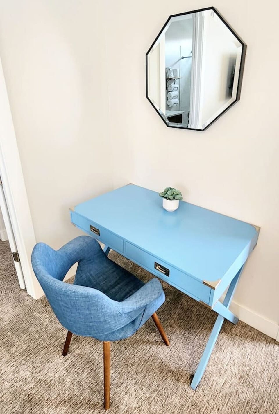 Work desk in queen bedroom with attached bathroom