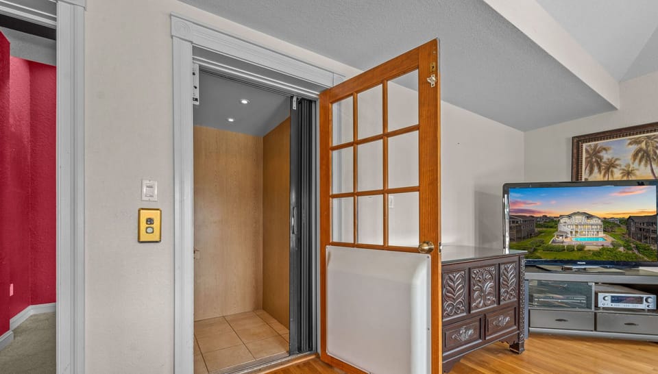 Surf or Sound Realty - 1151 - Sunsational - Elevator - Label