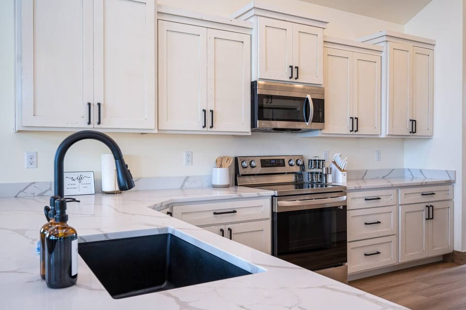 Cook your favorite meals in a kitchen bathed in natural light that enhance the culinary experience.
