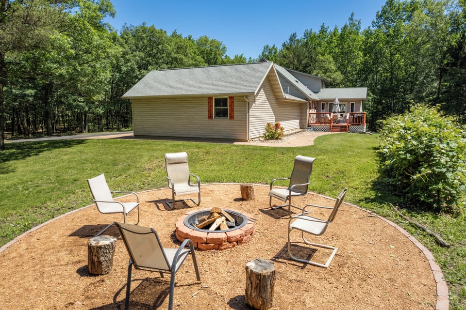 The firepit is located in the private and secluded backyard. Perfect for a relaxing evening.