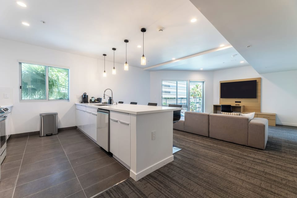 Suite, 2 Bedrooms, Non Smoking, Balcony | Living area | 65-inch LED TV with cable channels, streaming services