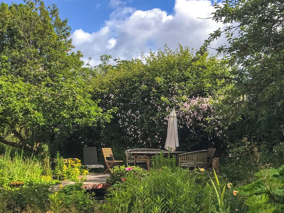 The main house garden - guests are welcome to use this space | Ynywsen Dairy Flat, Nantgaredig