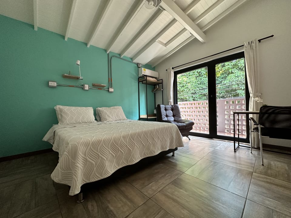 Comfort Double Room, 1 Queen Bed, Private Bathroom, City View | In-room safe, laptop workspace, free WiFi, bed sheets