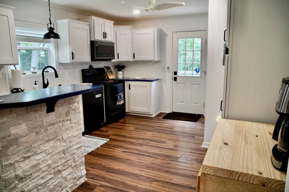 Kitchen with coffee bar and full size washer and dryer