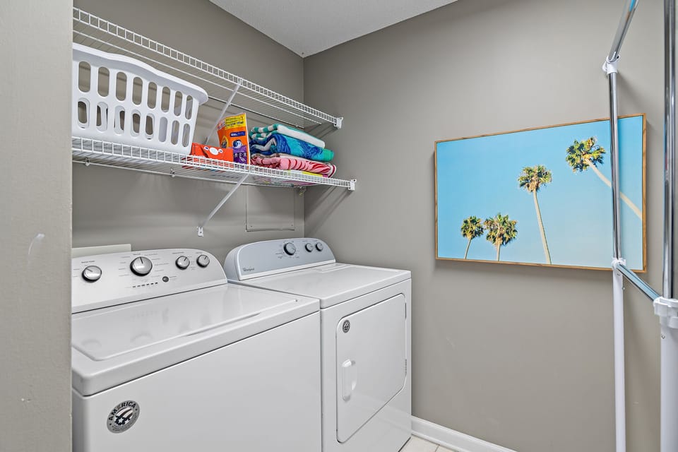 Full size washer and dryer inside the condo - we provide plenty of laundry supplies for your visit!