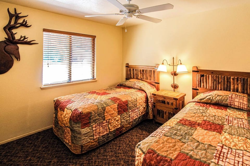 Your guest bedroom contains two cozy twins.