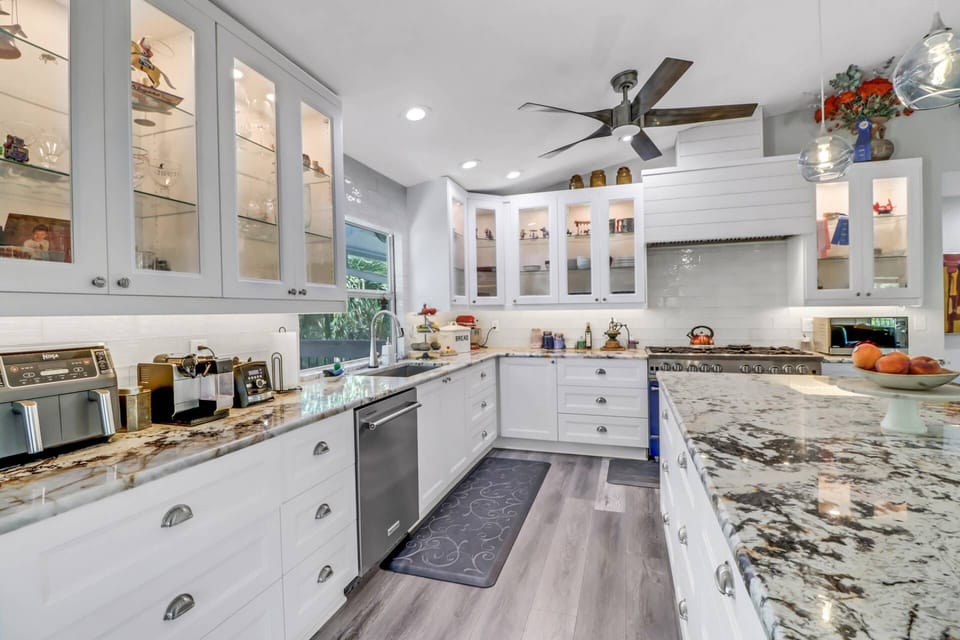 Cookware, dinnerware, and many kitchen tools and gadgets are provided - including an air fryer, KitchenAid stand mixer and Nespresso espresso machine.