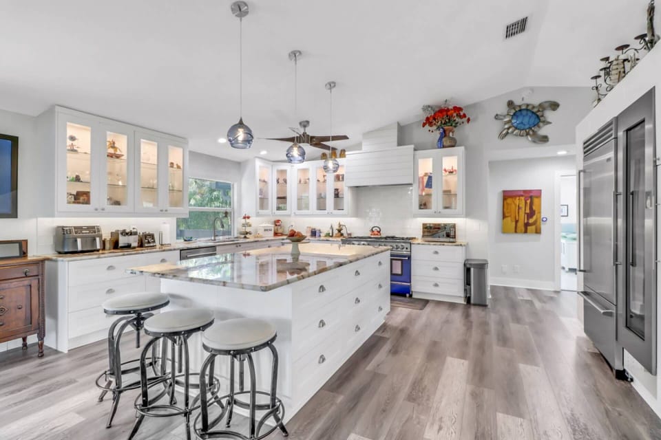 The showpiece of this home is the gorgeous kitchen, lavishly equipped with BlueStar professional appliances; you'll enjoy spoiling yourself!
