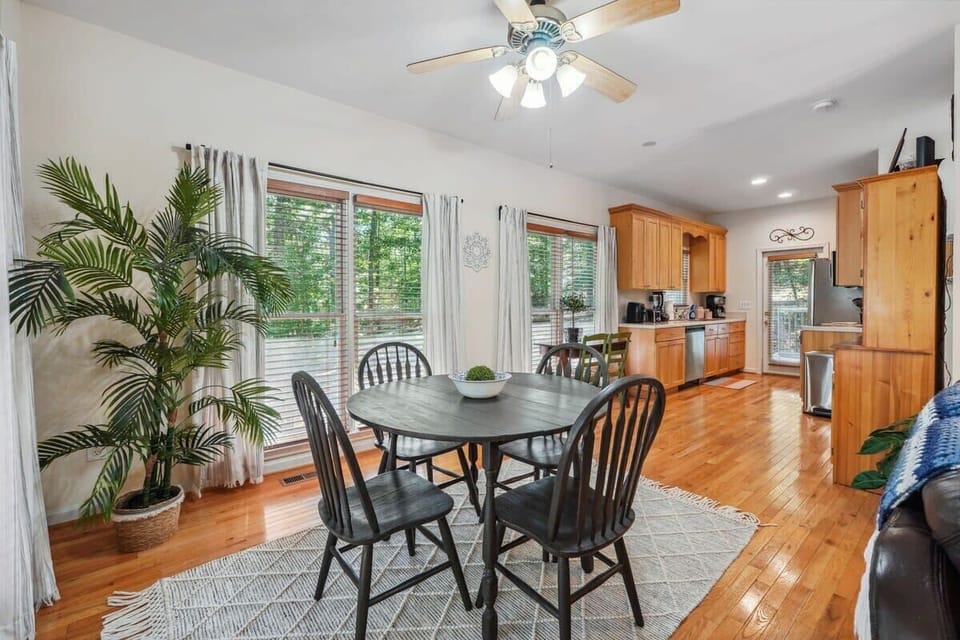 Seating for 4 at dining room table and 2 seats by the window to watch the deer!