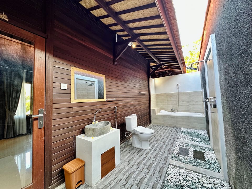 Separate tub and shower, hair dryer, bathrobes, bidet