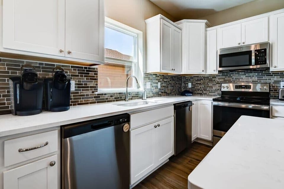 This large kitchen is perfect for your large group - two ovens and two dishwashers!