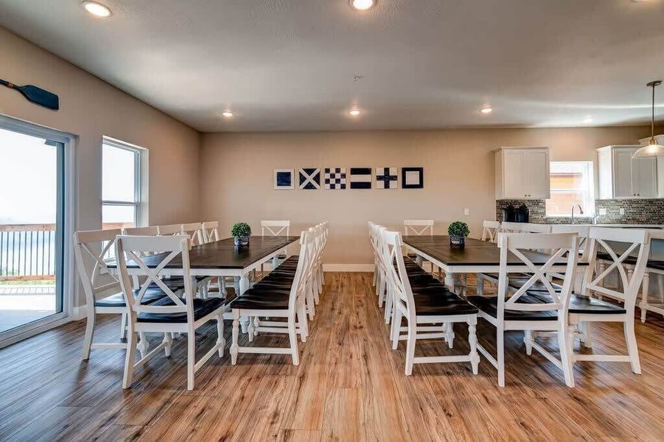 Two long dining tables provide plenty of seats for everyone to come together!