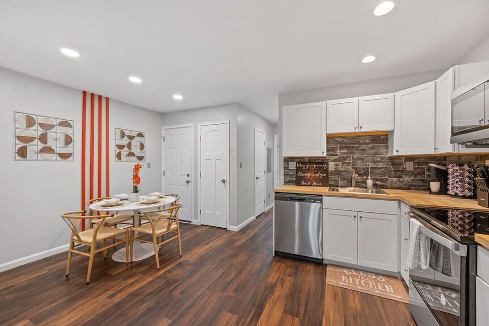 Modern kitchen and dining area.