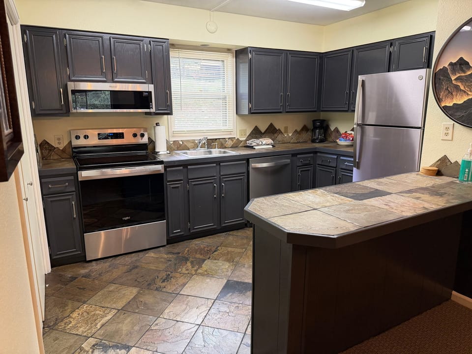 Condo, 2 Bedrooms | Private kitchen | Fridge, oven, coffee/tea maker, toaster