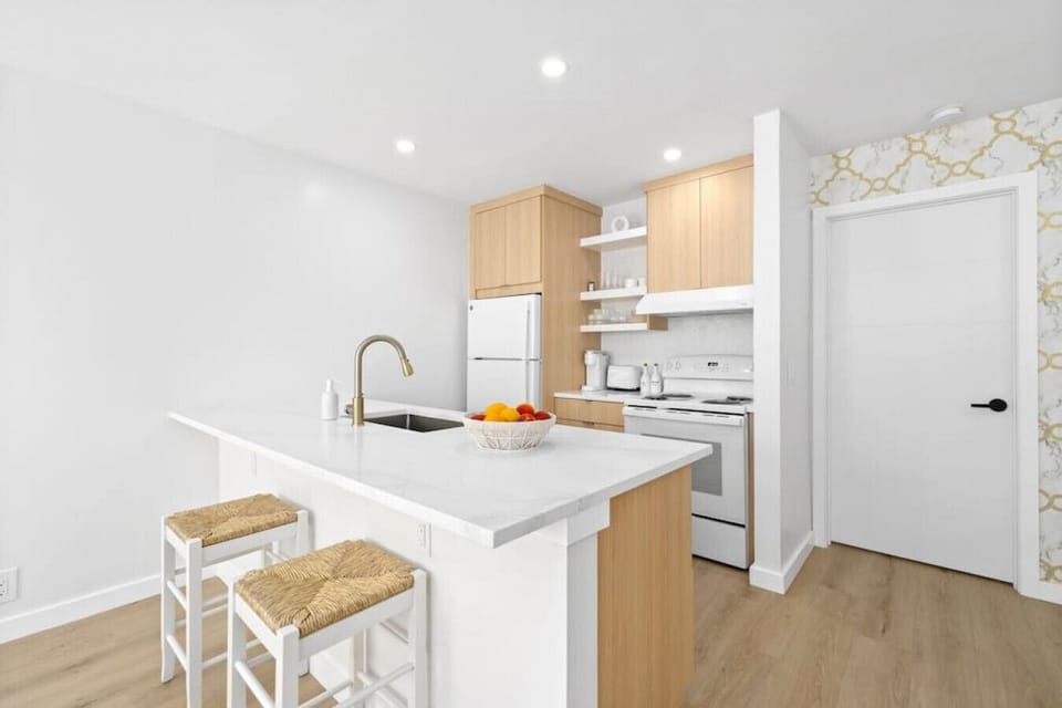 Gorgeous kitchen with Keurig coffee maker.