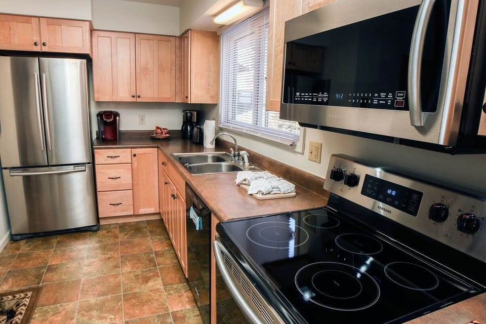 Condo, 2 Bedrooms | Private kitchen | Coffee/tea maker, fridge, oven
