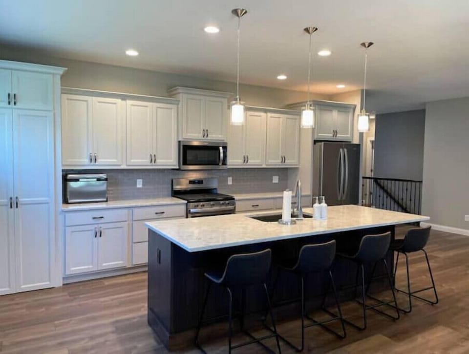 Kitchen with a walk-in pantry.