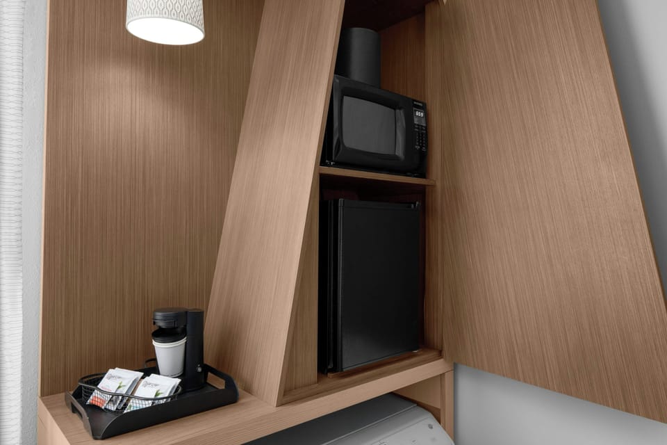 Premium bedding, desk, blackout drapes, iron/ironing board