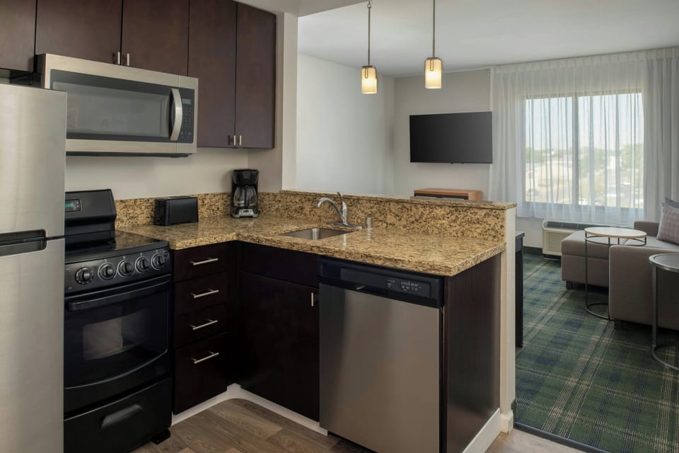 Suite, 2 Bedrooms | Private kitchen | Coffee/tea maker, full-size fridge, microwave, stovetop