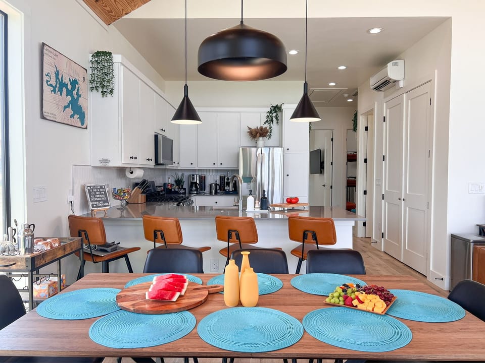 The open kitchen design features a peninsula and plenty of room to prepare meals. The perfect place to entertain family and friends.