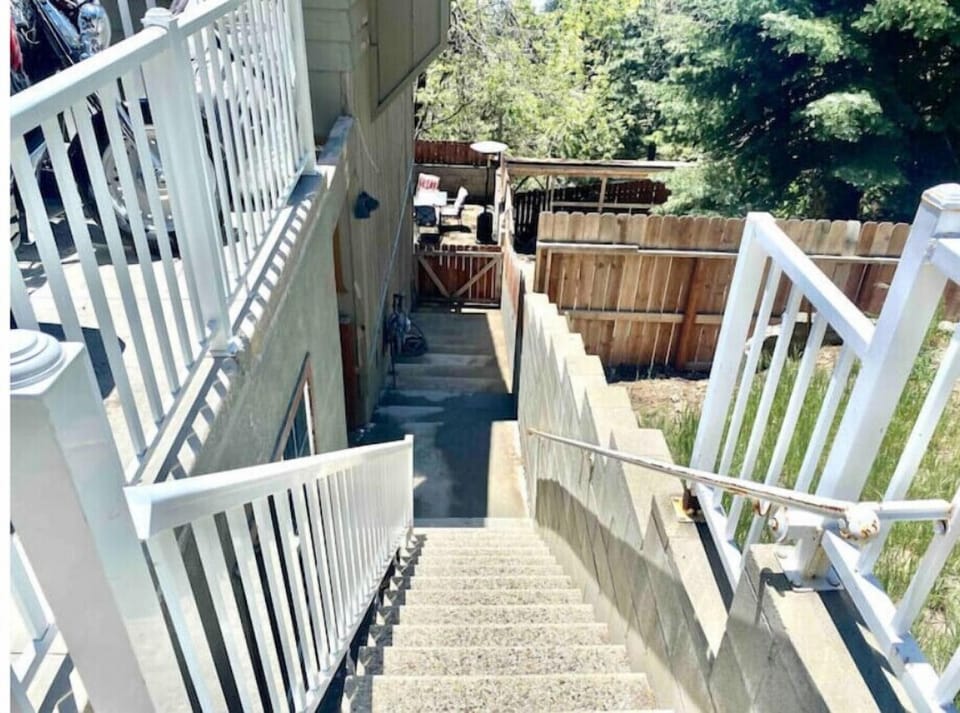 Walkway to room. The room is down the stairs on the bottom floor