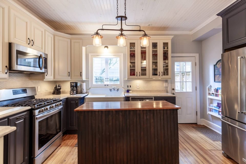 The gourmet kitchen is fully stocked for the chef to prepare a family meal.