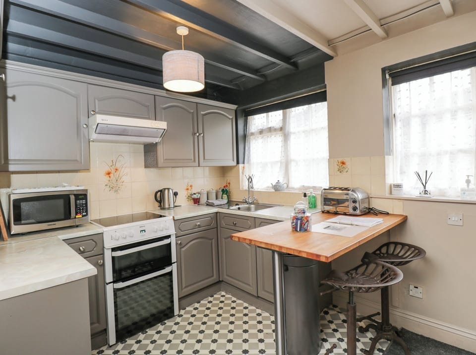 Fridge, electric kettle, toaster, cookware/dishes/utensils