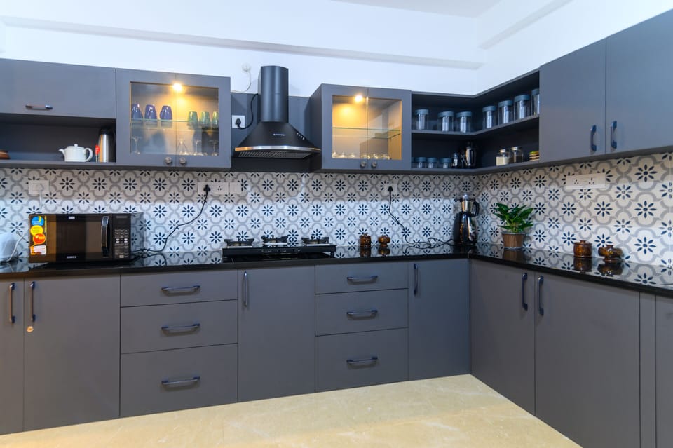 Presidential Villa | Private kitchen | Full-size fridge, microwave, stovetop, coffee/tea maker