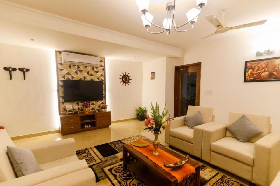 Royal Villa, 4 Bedrooms | Living area | 43-inch LED TV with satellite channels