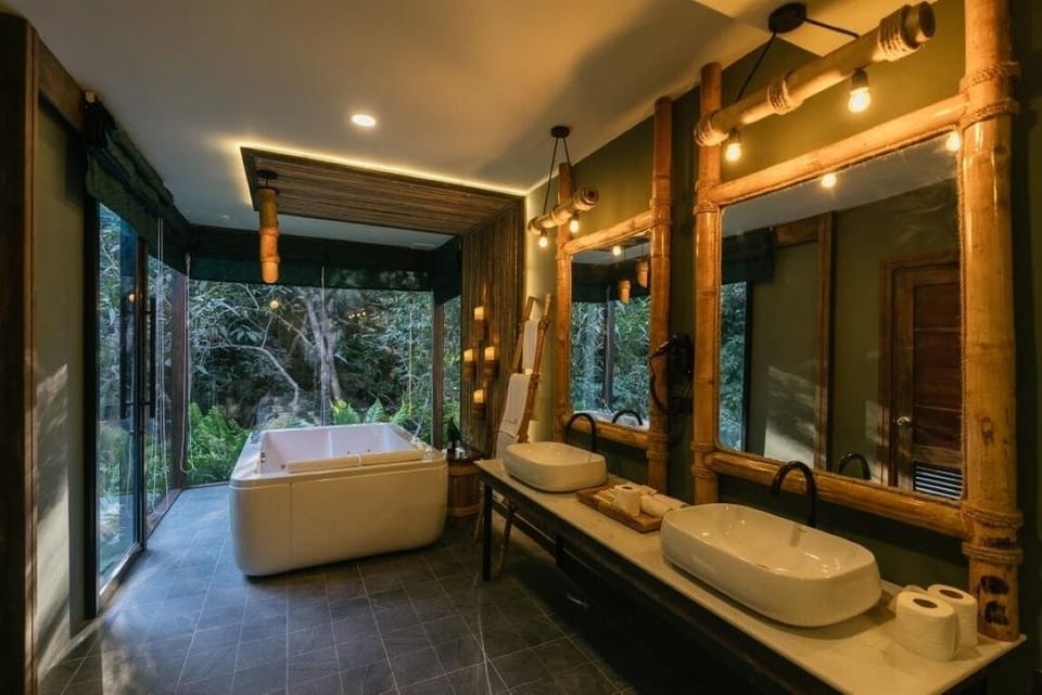 Rainforest Villa | Bathroom | Hair dryer, bathrobes, slippers, bidet