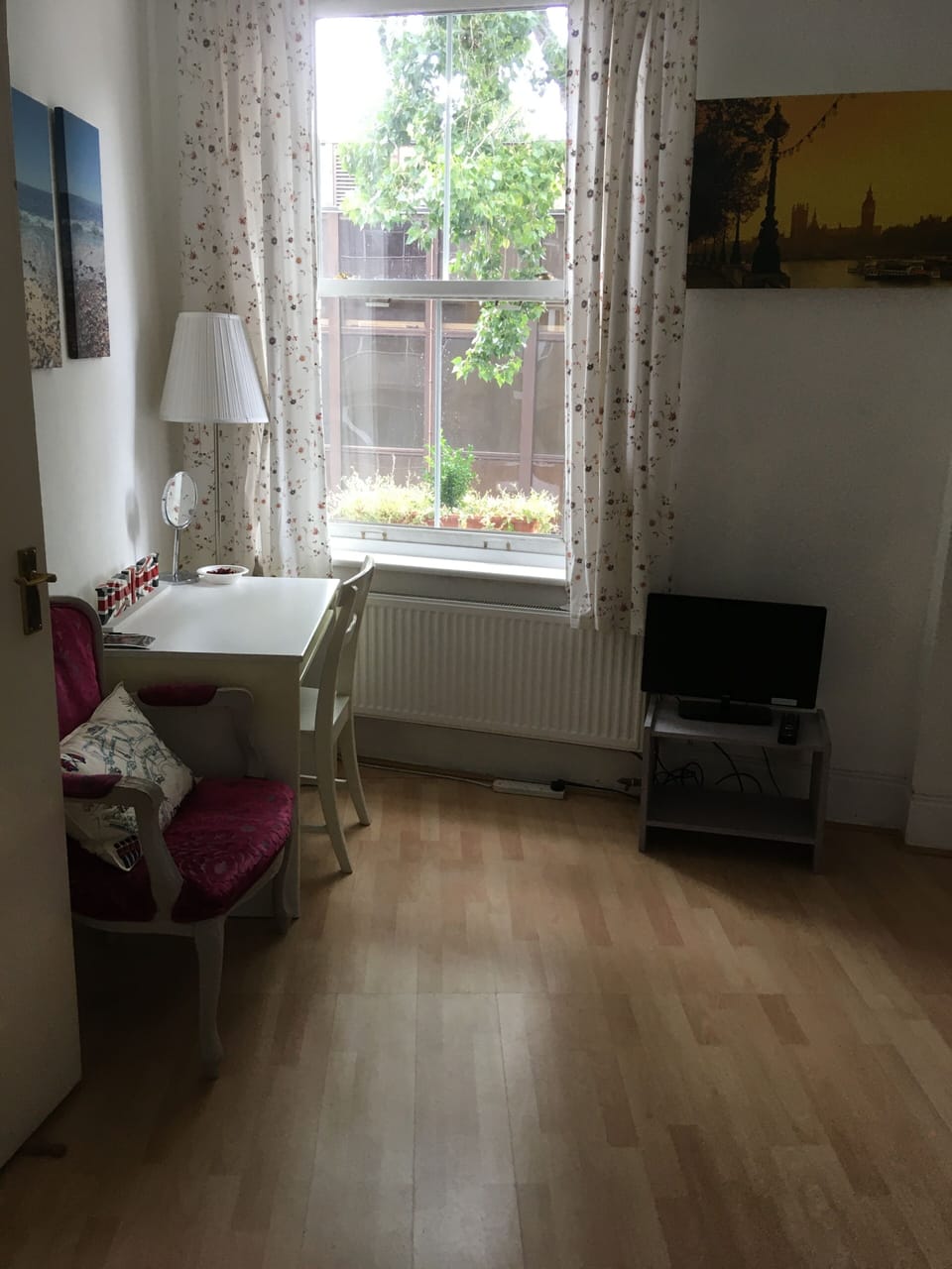 Basic Apartment | Living area | 26-inch flat-screen TV with digital channels