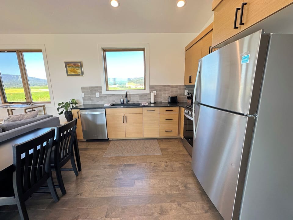 The kitchen is fully stocked and equipped with brand-new appliances — it is a breeze preparing any meal.